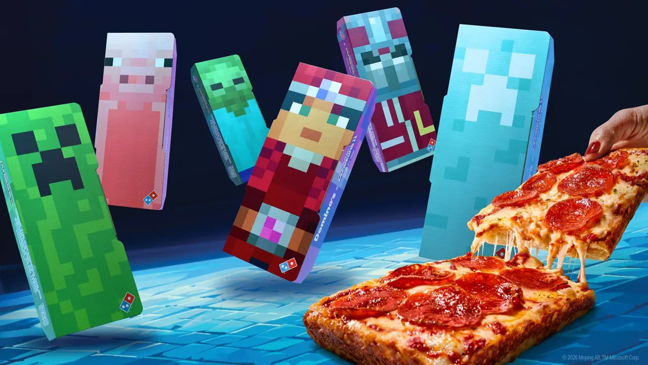 Six collectible Domino's boxes with Minecraft Dungeons II designs next to a Detroit-style pepperoni pizza.